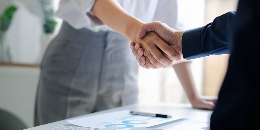 bigstock-Business-Investor-Group-Holdin-472780261
