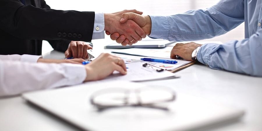 bigstock-Business-meeting-at-the-table-99066275