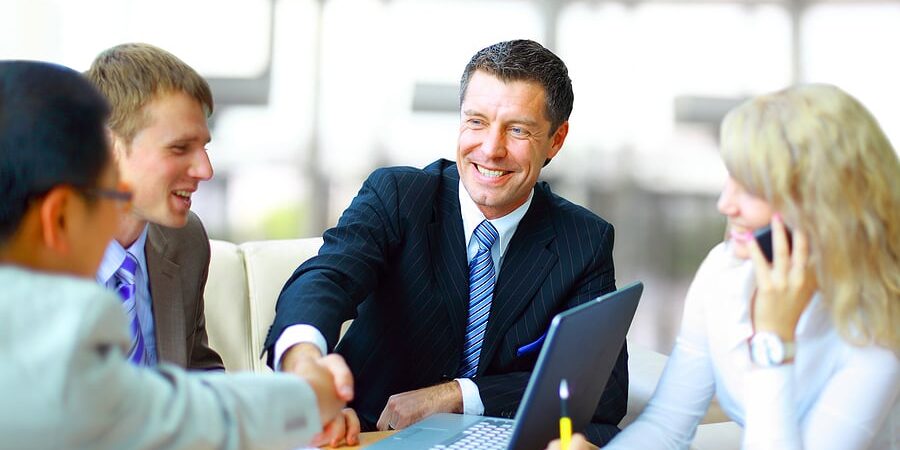 bigstock-Business-people-shaking-hands-13869770