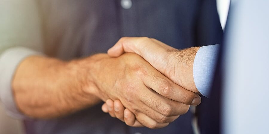bigstock-Close-up-of-friendly-handshake-343674547