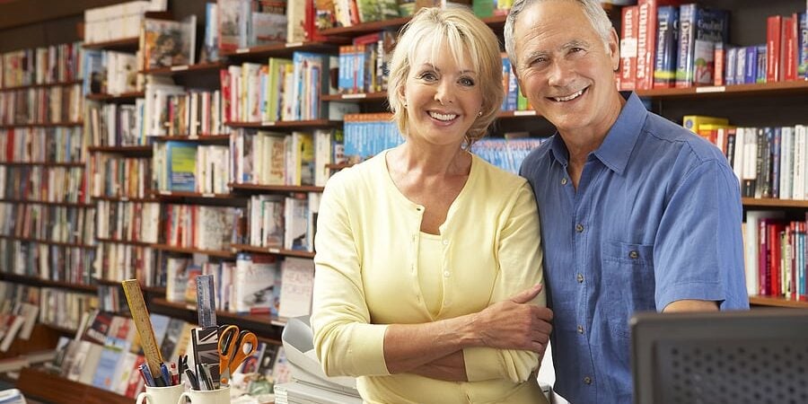 bigstock-Couple-running-bookshop-13904324