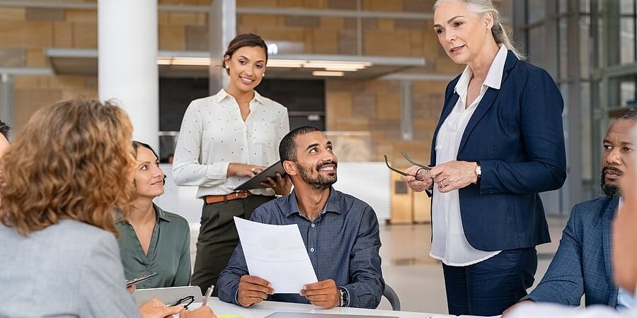 bigstock-Group-of-business-people-discu-436795940
