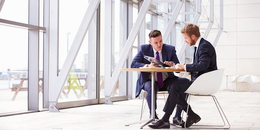 bigstock-Two-business-colleagues-at-mee-101229776-1