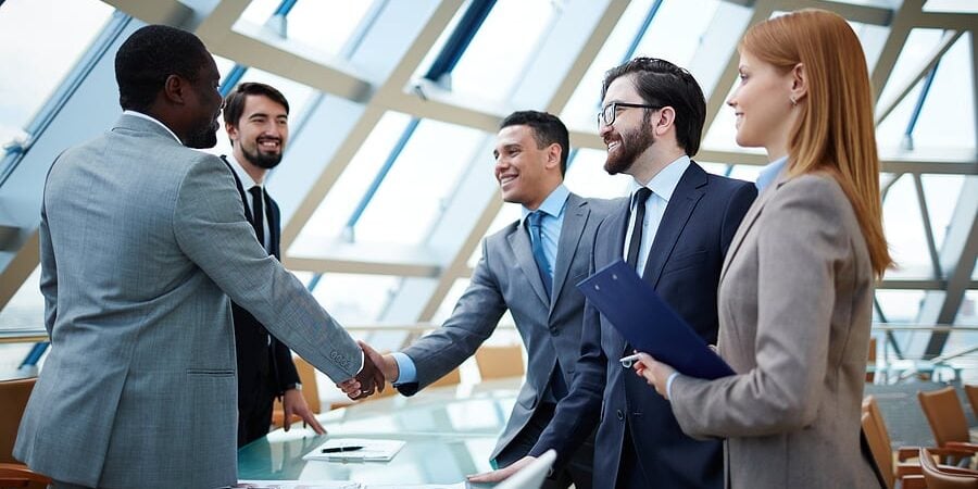 bigstock-Two-businessmen-handshaking-af-66427792